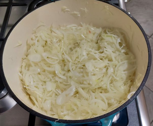 Sliced onions being caramelised